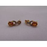 A pair of 9ct yellow gold, pink stone and diamond earrings, approx total weight 1.6g