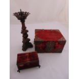 A continental carved wooden pricket candlestick, a metal mounted rectangular casket with hinged