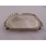 A silver presentation card tray of square form with incuse borders on four bracket feet, Sheffield