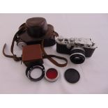 Leica DRP camera with Canon lens to include leather case