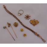 A quantity of gold jewellery to include a brooch, two pins, a ring, two studs and a bracelet, approx