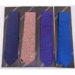 Four Dunhill silk ties in original packaging