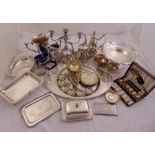 A quantity of silver plate to include jugs, dishes, entrée dish and cover and a tea tray