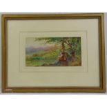 Fred Walmsley framed and glazed watercolour of a boy seated under a tree, signed bottom left, 14 x