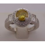 18ct white gold and diamond ring, centre stone natural yellow diamond 1.15ct, GIA certificate