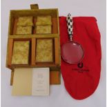 A 1930s Waddingtons leather cased bridge set with two packs of playing cards, a Royal auction bridge