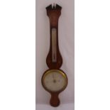 A period mercury shell banjo barometer of customary form with brass bezel and silvered dials