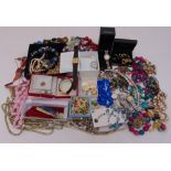 A quantity of costume jewellery to include necklaces, brooches, bracelets and wristwatches