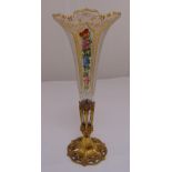 A Bohemian glass vase hand painted floral sprays and gilding on pierced shaped circular gilded metal