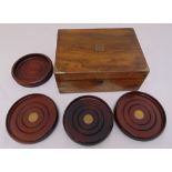 A Victorian mahogany writing slope with brass mounts and four turned wooden wine coasters (5)