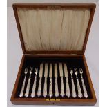 A cased set of Athlone pattern silver fruit eaters with silver blades for six place settings,