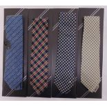 Four Dunhill silk ties in original packaging