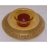 A continental circular amber glass rose bowl with scrolls chased border, 8cm (h) 34cm (dia)