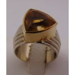 A gold and citrine ring, tested 14ct, approx total weight 15.9g