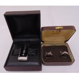 Dunhill silver money clip and a pair of Dunhill silver cufflinks both in original packaging