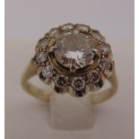 18 carat white gold and diamond cluster ring, centre stone approx .75 carat, approx total weight 3.