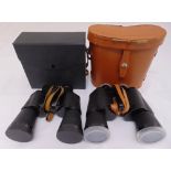Two pairs of binoculars in fitted cases