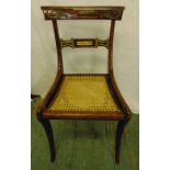A late 19th century mahogany occasional chair with caned seat