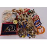 A quantity of costume jewellery to include necklaces, bracelets, earrings and rings