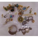 A quantity of silver and costume jewellery to include earrings, brooches and necklaces