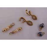 A pair of gold earrings with interchangeable drops with various coloured stones, tested 9ct,