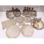 A quantity of white metal and silver plate to include dishes, trays and candlesticks