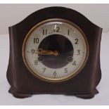 An original 1930 Bakelite chiming mantle clock with Roman numerals on shaped pad feet, 19cm (h) 20cm