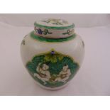 A Chinese famile verte ginger jar decorated with stylised figures and flowers with raised pull off