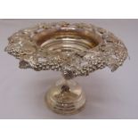 A continental white metal fruit stand shaped circular with beaded and pierced vine border, approx