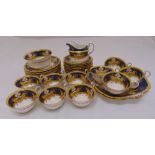 An Aynsley tea set to include plates cups and saucers and a cream jug (36)