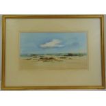 Herbert Turner framed and glazed watercolour of a beach scene with rocks, signed bottom right, 21