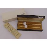 Parker 61 Cumulus gold plated fountain pen with 14ct gold nib and a matching ball point pen in