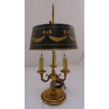 A three branch lamp stand with painted metal shade on raised circular base, 60cm (h)