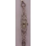 Platinum and diamond Art Deco ladies wristwatch on a 9ct white gold bracelet, approx total weight