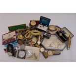 A quantity of costume jewellery to include necklaces, brooches and earrings