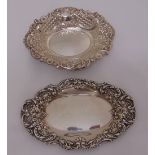 Two silver hallmarked bonbon dishes oval form chased with flowers and leaves, approx weight 142g