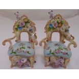 A pair of continental bocage porcelain chairs with applied figures, cats and flowers, 21cm (h)