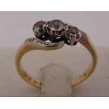 9ct and silver three stone crossover ring, approx total weight 3.0g