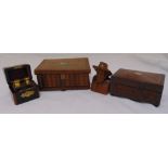 A quantity of treen to include two scent bottles in a fitted case and a tea caddy (4)