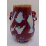 A Chinese flamb‚ glazed vase with elephant mask side handles, 27.5cm (h)