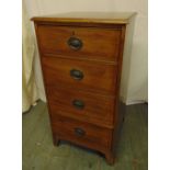 A rectangular mahogany chest of four drawers with brass swing handles on bracket feet, 107 x 56.5