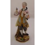 Meissen 19th century figurine of gentleman in 18th century costume on stylised base, marks to the