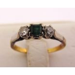 Gold three stone emerald and diamond ring, tested 18ct, approx total weight 2.6g