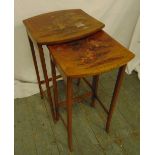 A nest of two fruitwood side tables, the tops painted with Chinoiserie scenes, 67.5 x 36.5 x 34.5cm