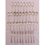 A quantity of Kings pattern silver plated flatware to include forks, table spoons, soup spoons and