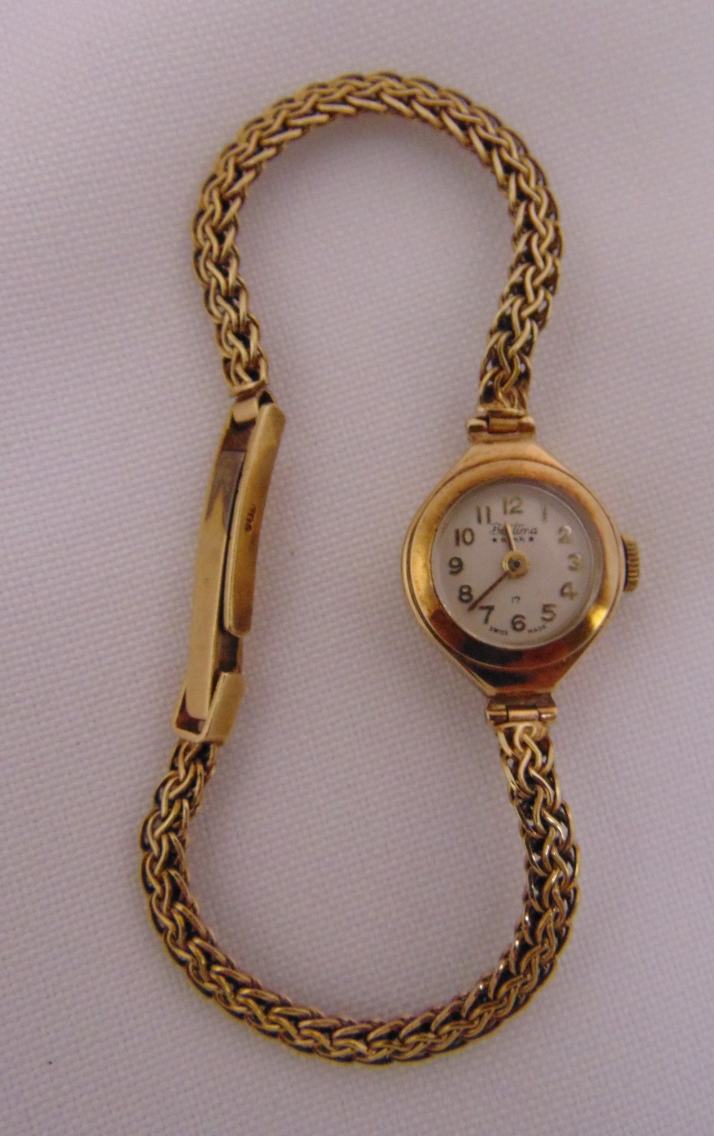 9ct yellow gold Betina Star ladies wristwatch on a 9ct gold articulated bracelet, approx total