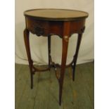 A mahogany circular occasional table on four tapering sabre legs, 77 x 48.5cm