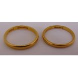 Two 22ct yellow gold wedding bands, approx total weight 5.4g