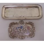 A silver pen tray, rounded rectangular with gadrooned border, London 1979 and another heavily