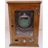 The All Win Deluxe rectangular wooden framed coin operated game with glazed hinged door, lock